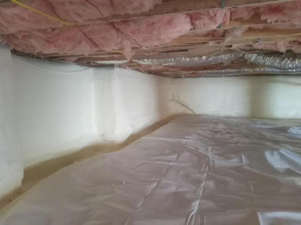 Crawl space encapsulation with closed-cell spray foam for Roof Waterproofing in Denison